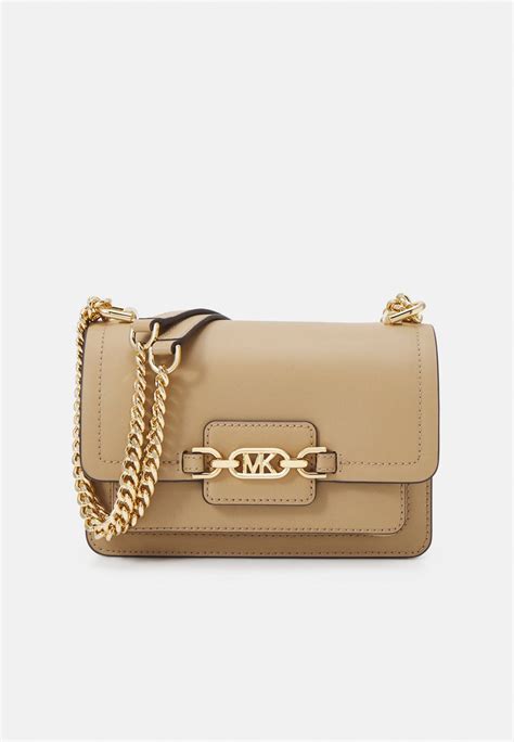 michael kors umhängetasche fälschung|michael kors bag lookup.